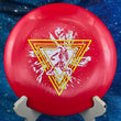 Load image into Gallery viewer, Top view of a Red Innova Star Leopard disc featuring a Neon Yellow and White 2-foil "Neon Astro" Special Edition stamp on a cosmic blue background.
