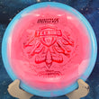 Load image into Gallery viewer, Pink and blue Halo Star Teebird disc golf driver, 2026 Joona Heinanen Champion Series tour stamp with red matte foil.
