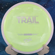 Load image into Gallery viewer, Top view of a Neon Yellow Neutron MVP James Conrad Series Trail distance driver featuring the Project Lab Coat white GYRO rim and a silver tri-foil stock stamp, 174g, 10/10 condition.
