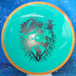 Load image into Gallery viewer, Orange Swirl Rim and Teal Neutron Plastic Axiom Simon Line Bokeh Unearthed Stamp - 173g - Dark Stars Stamp.
