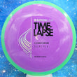 Load image into Gallery viewer, Pre-Owned Green Rim with Purple Swirl Axiom Discs Time Lapse from the Simon Line in Premium Neutron Plastic - 8/10 Condition, Inked - 175g.
