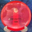 Load image into Gallery viewer, Top view of a Red pre-owned Discmania MD3 stable midrange disc in C-Line plastic, featuring a silver "Discmania" shield stamp, rated 8.5/10 condition and marked as inked.
