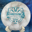 Load image into Gallery viewer, Pre-Owned 2021 Ledgestone Edition ESP Swirl Discraft Meteor - Grey and White Swirl - 9/10 Condition - 173g - Uninked.
