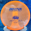 Load image into Gallery viewer, Pre-Owned Orange Calvin Heimburg Signature Series Champion Plastic Innova Toro - 8/10 Condition - 170g - Uninked.
