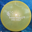 Load image into Gallery viewer, Yellow Prodigy A2 in 500 plastic with White Matte Inner Peace stamp - 173g.
