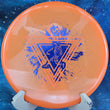 Load image into Gallery viewer, Top view of a Neon Orange Prodigy A5 approach disc in 400 Ultra Soft plastic featuring an Orange and Blue Shimmer 2-foil "Throwing Astro" Special Edition astronaut stamp.
