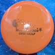 Load image into Gallery viewer, Orange Prodigy M3 in 400 plastic with Gold Holo Inner Peace stamp - 179g.
