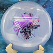 Load image into Gallery viewer, Top view of a translucent "Burple" (Blue-Purple) Prodigy M4 midrange disc in 400 plastic featuring a Pink and Purple holographic 2-foil "Throwing Astro" Special Edition astronaut stamp.
