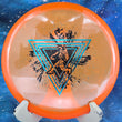 Load image into Gallery viewer, Top view of a Neon Orange Prodigy M4 midrange disc in 400 plastic featuring a Blue Holographic and Black 2-foil "Throwing Astro" Special Edition astronaut stamp.
