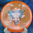 Load image into Gallery viewer, Top view of a Neon Orange Prodigy M4 midrange disc in 400 plastic featuring a Blue Holographic and White 2-foil "Throwing Astro" Special Edition astronaut stamp.
