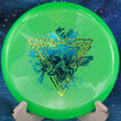Load image into Gallery viewer, Top view of a Lime Green Prodigy Pivot putter in 400 Color Glow plastic featuring a Leopard Print and Blue Shimmer 2-foil "Throwing Astro" Special Edition astronaut stamp.
