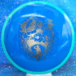 Load image into Gallery viewer, Teal Swirl Rim and Dark Blue Neutron Plastic Axiom Simon Line Bokeh Unearthed Stamp - 174g - Dark Stars Stamp.
