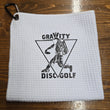 Load image into Gallery viewer, White Gravity Disc Golf 16x16 Waffle Towel with Carabiner Clip.
