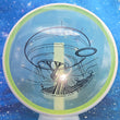 Load image into Gallery viewer, White Swirl Rim and Yellow Particle Proton Plastic Axiom Paradox Circuit Challenge - 178g - Black Stamp.
