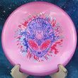 Load image into Gallery viewer, New Metallic Pink Wild Discs Sea Otter in Premium Lava Plastic - Special Edition 3-Foil Magenta, Blue, and Silver Alien Head Stamp - 175g.
